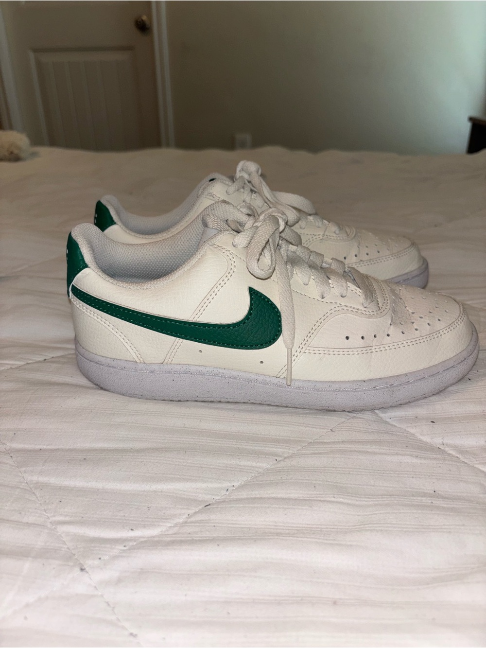 Nike White Low-Top Sneakers with Green Swoosh